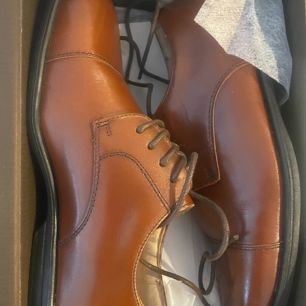 Boys brown dress shoes 
Florsheim